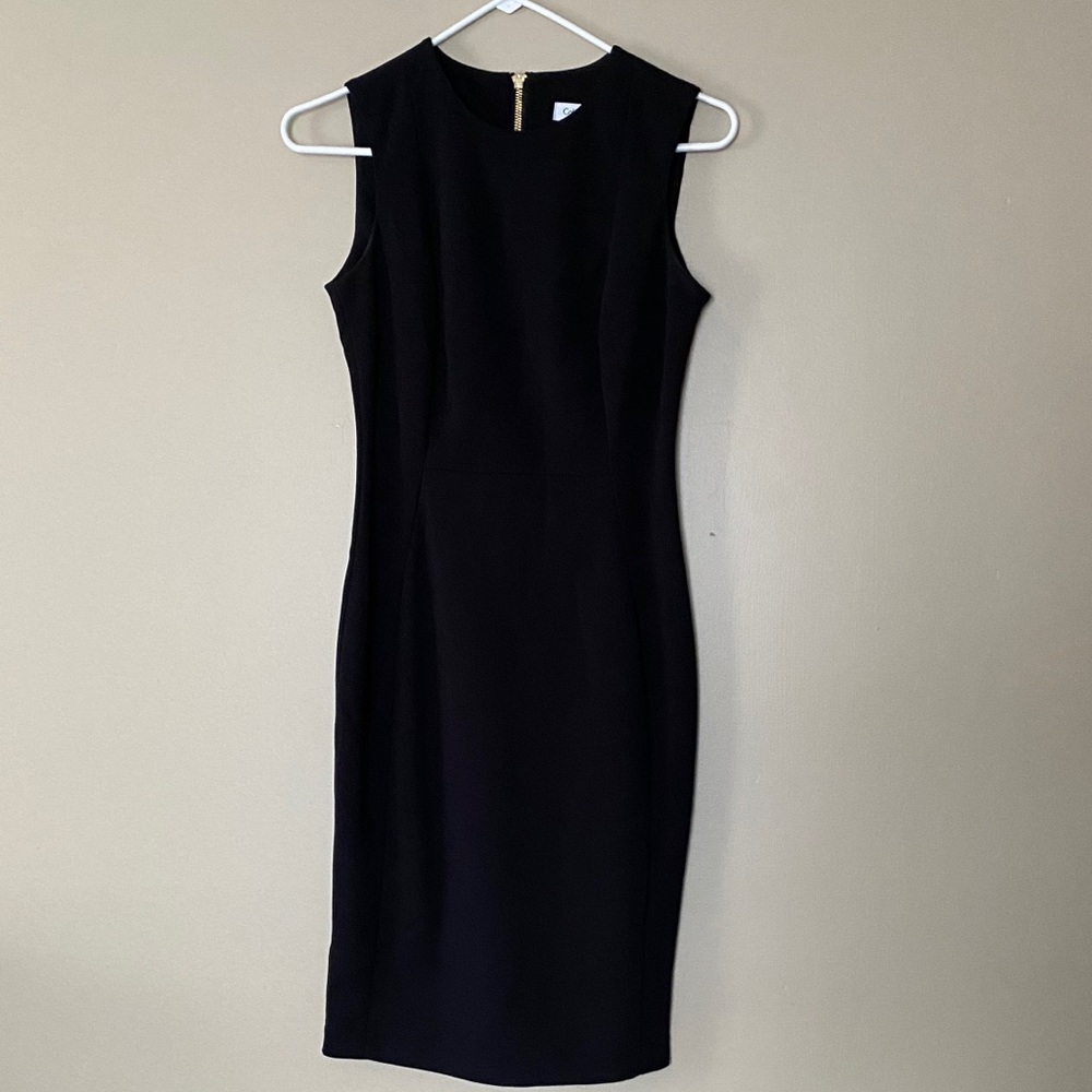 Black sleeveless sheath dress